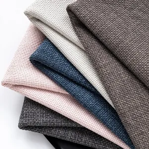 Pile de tissus en lin grossier tissé épais en couleurs variées pour les housses