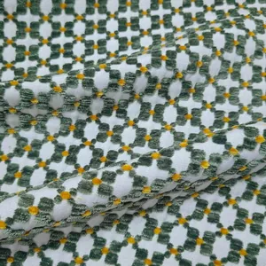 Vintage green jacquard fabric with textured geometric floral pattern for DIY upholstery