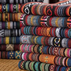 Ethnic tribal style woven fabric with colorful geometric patterns for upholstery and decor