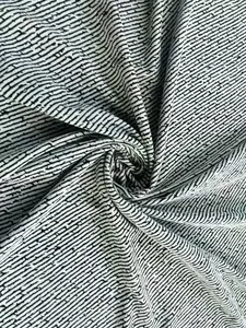 High-quality macro view of black and white Chenille twill fabric with bold diagonal pattern