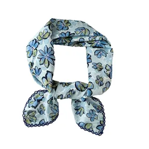 Light blue cotton floral square scarf with daisy print and navy crochet lace trim detail