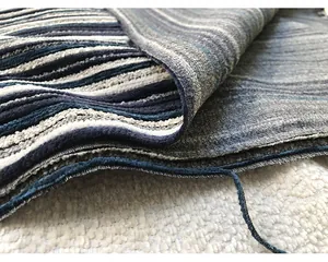 Detailed close-up of blue and grey striped chenille fabric showing soft textured ridges
