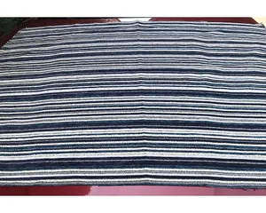 Detailed texture of blue and white striped chenille fabric for cushions and sofa covers