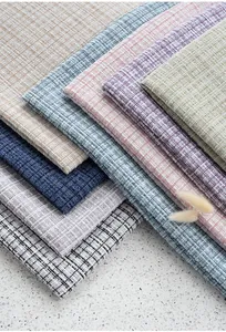Detailed macro view of various colorful sparkly tweed fabrics for DIY clothing