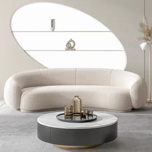 Elegante divano moderno curvo in velluto bouclé bianco crema per un soggiorno di lusso