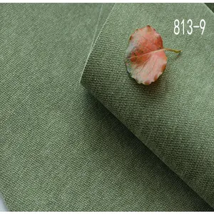 Gros plan de haute qualité d'un tissu chenille vert épais pour le revêtement de canapé
