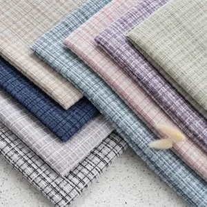 Selection of colorful luxury tweed fabrics with metallic silk thread details