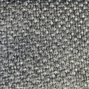 Vista macro detallada de tela de lino gris gruesa que muestra el patrón de tejido texturizado