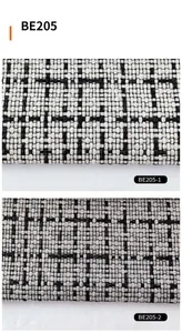 Black and white woven coarse linen fabric detail shot, perfect for bags and upholstery.
