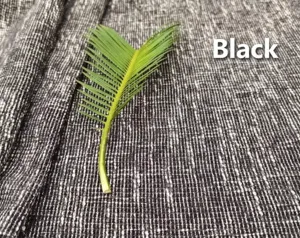 Vista macro di tessuto ciniglia spesso in cotone e lino nero per arredamento