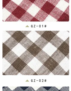 Close-up view of classic linen checkered fabric swatches in various colors for upholstery