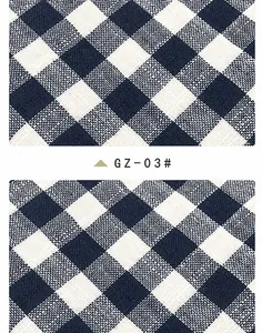 Close-up detail of navy and white checkered linen fabric for home decor and upholstery