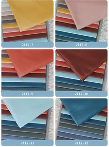 Detailansicht von wasserdichten Funktionsstoffmustern in einer Vielzahl kräftiger Farben