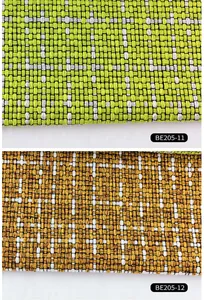 Close up detail of coarse linen fabric showing woven grid texture for bags and cushions