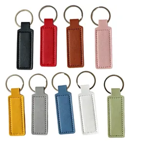 Juego de 9 llaveros rectangulares de piel sintética de colores con anillas para tags