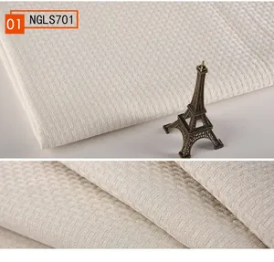 Makroansicht von beige Baumwolle Leinen Stoff mit Rattan Webstruktur für Sofabezüge