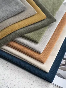 Macro detail of textured chenille fabric samples in earthy tones for sofa and upholstery