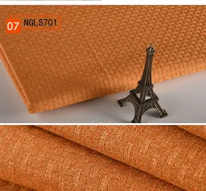 Detailansicht eines dicken orangefarbenen Stoffes mit gewebter Struktur für Sofas
