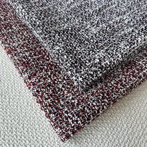 Close-up detail showing the rich texture of coarse tweed fabric for cushions and pet mats