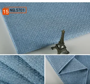 Nahaufnahme von blauem Stoff mit Rattan-Webstruktur für Polster und Kissenbezüge
