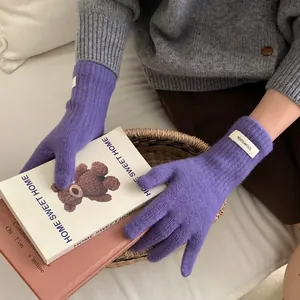 Purple Merino wool knitted gloves for women with 100% wool label for winter warmth
