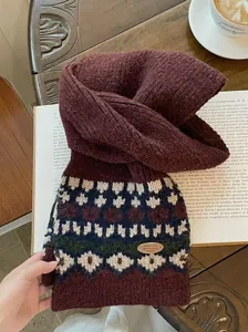 Close-up of Fair Isle jacquard pattern on a warm knitted winter scarf