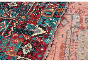 Close-up detail of vintage ethnic jacquard fabric showing front and back texture.