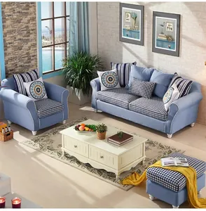 Light blue faux linen sofa covers with European style checkered patterns in a living room.