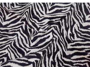 Dettaglio tessuto ciniglia jacquard zebra, materiale tappezzeria nero bianco per divano cuscino.