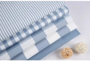 Selection of blue and white patterned faux linen fabrics for home DIY sewing projects