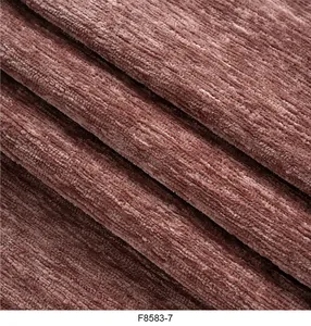 Dettaglio della trama macro del tessuto in ciniglia rosa antico per tappezzeria