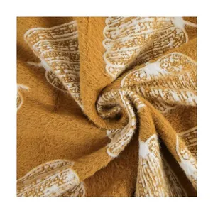 Tissu en velours de vison jaune citrouille doux avec motif de feuilles blanches pour couvertures