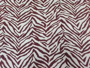 Primo piano di tessuto ciniglia jacquard con motivo zebrato di lusso per cuscini.