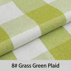 Close-up of grass green and white gingham cotton linen fabric with thick texture