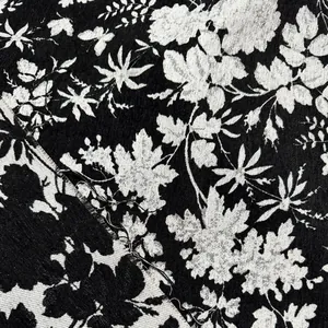 Dettaglio macro del tessuto jacquard in ciniglia floreale bianco e nero di alta qualità