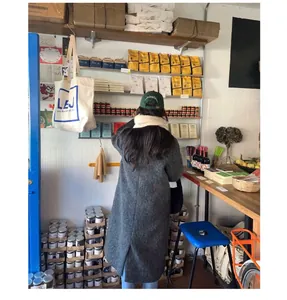 Premium soft thick wool neck warmer for winter seen in a natural lifestyle shop setting
