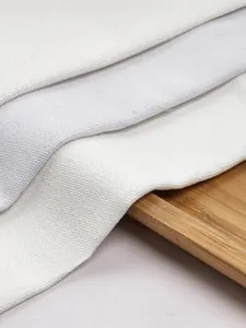 Macro detail of thick high-density white cotton linen canvas fabric material texture