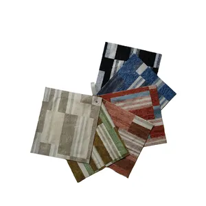 Thick jacquard chenille fabric swatches with classic geometric grid patterns for sofa decor.