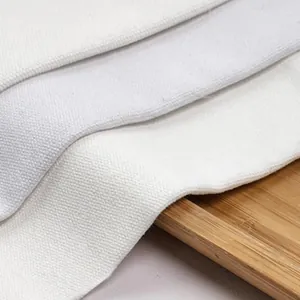 Premium high-density thickened white cotton linen canvas fabric for DIY crafts and bags.