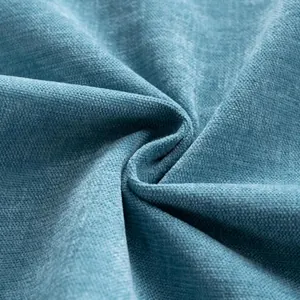 Macro de tela de chenilla azul gruesa con textura de terciopelo suave para tapicería.