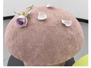Close-up detailed texture view of soft thickened pink velvet fabric for toys and pillows