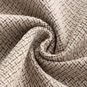 Detailed close-up texture of thickened cotton linen upholstery fabric in beige