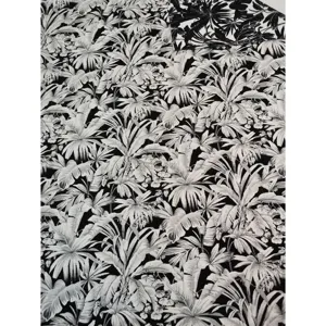 Tessuto jacquard di ciniglia con motivo a foglie di palma tropicale in bianco e nero