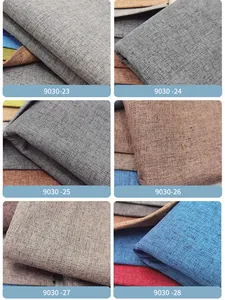 Vista macro de varias muestras de tela con textura de lino de color sólido para sofás