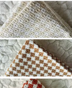 Close-up macro detail of thickened cotton linen checkered fabric swatches for sewing