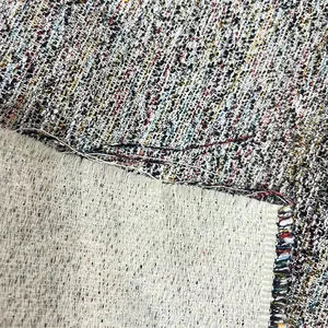 Tissu tweed coloré en coton et lin épais pour l'ameublement et vêtements vue macro