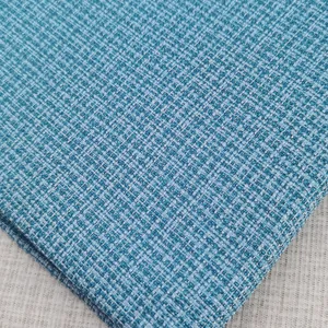 Tela de lino tweed azul de alta calidad con textura tejida para sofás y cojines.