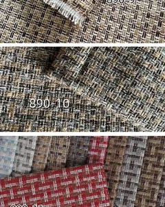 Makro-Detailansicht verschiedener garngefärbter Leinenimitat-Stoffe mit Karomuster für Sofas