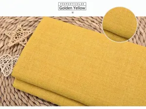 Macro-detailopname van goudgele grove linnen stoftextuur voor bekleding en kussens