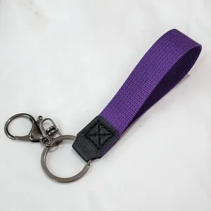 Durable purple nylon webbing keychain with gunmetal ring and black leather connector